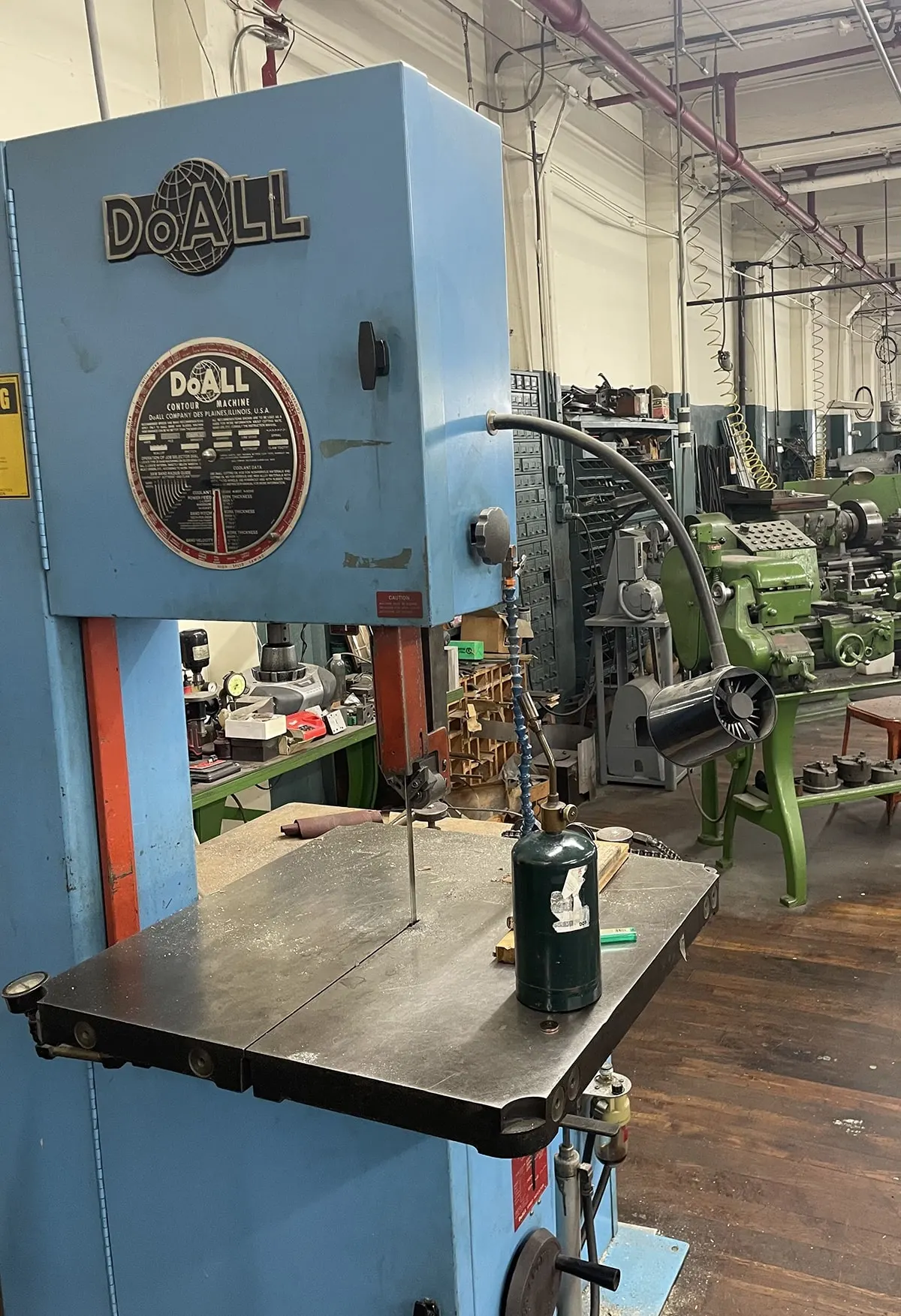 A DoAll vertical band saw in the tool room