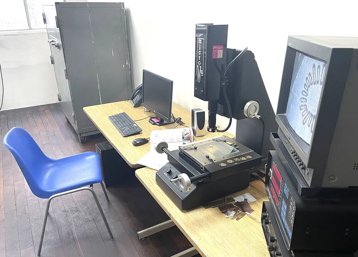 A computer-controlled machining station in the tool room